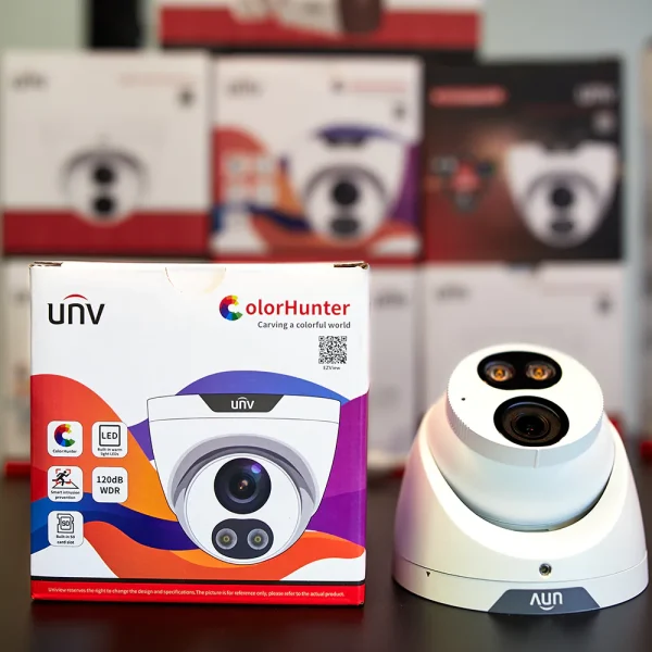 Uniview 5MP ColorHunter camera on a black shelf with retail box on the left side