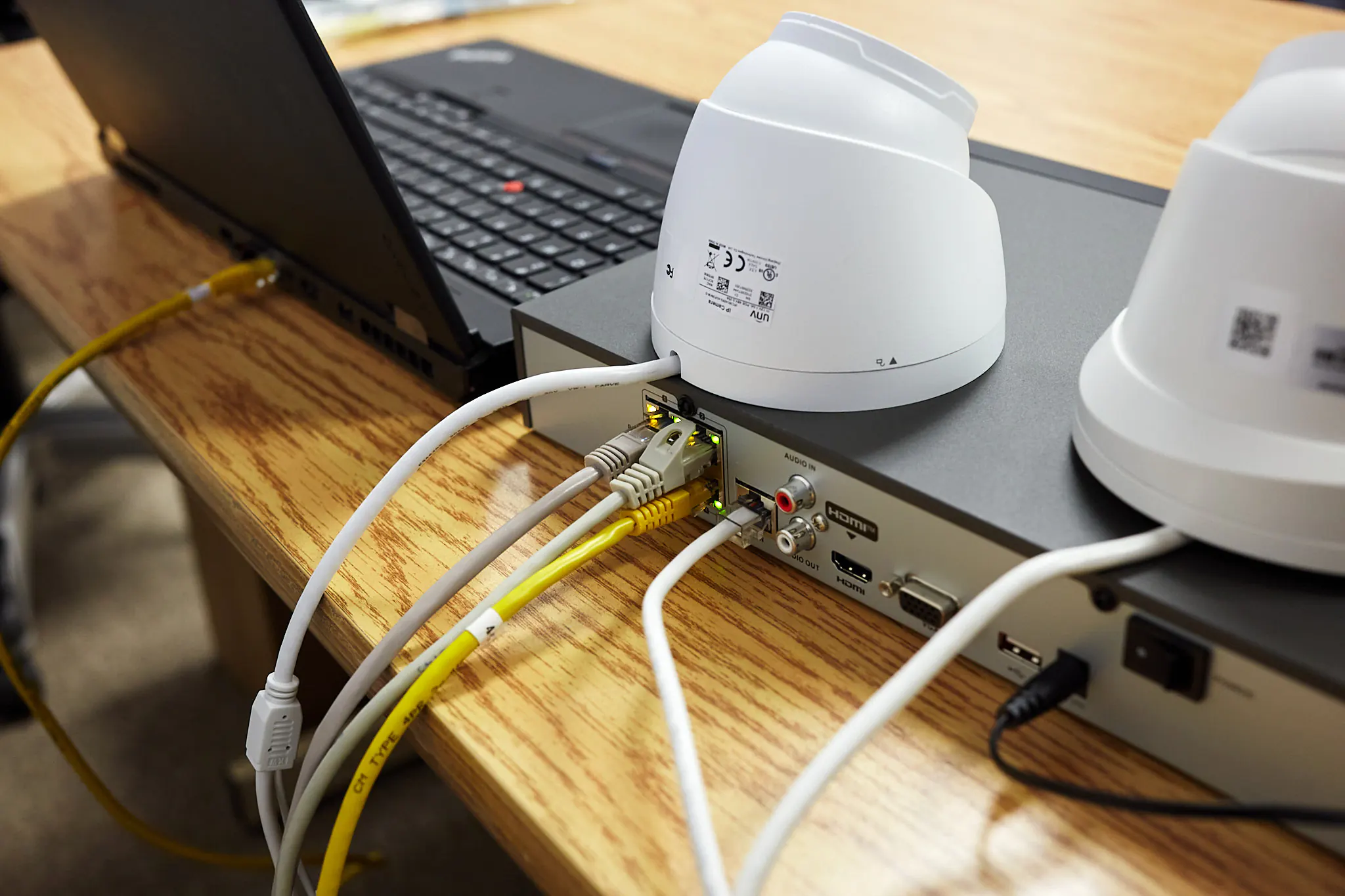 Security cameras plugged into PoE port of NVR