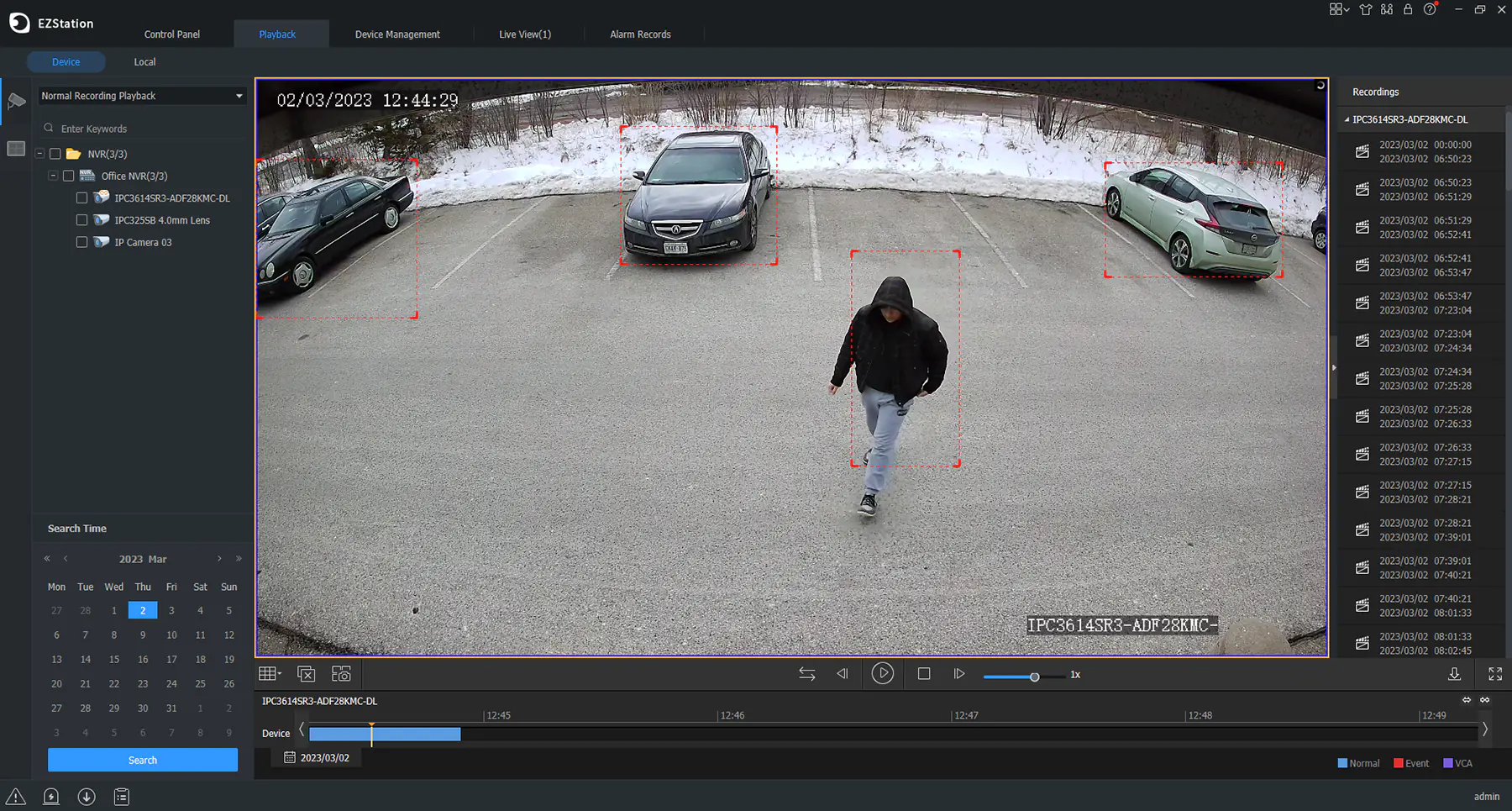 EZStation 3.0 software on PC showing a security camera with a red bounding box around vehicles and people