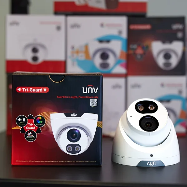 Uniview 5MP Tri-Guard Uniview camera on a black shelf with retail box on the left side