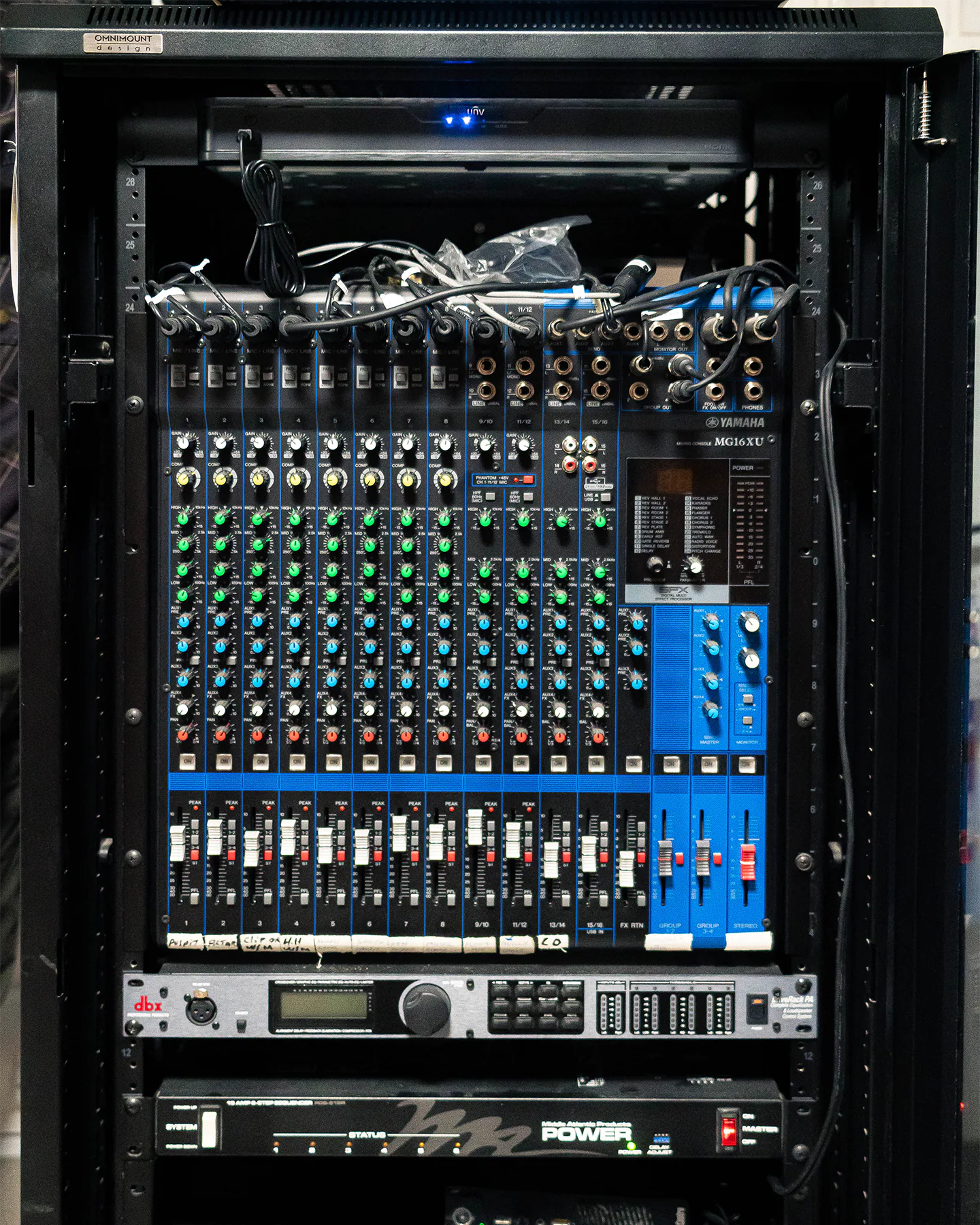 Server rack with audio equipment and security camera system