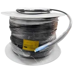 A spool of fiber optic cable wrapped in plastic