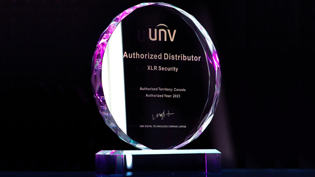 A glass plaque that says "UNV Authorized Distributor XLR Security".