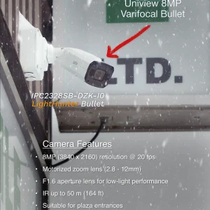 A poster depicting a Uniview 8MP Varifocal bullet camera mounted on the side of a building with snow falling in the background. The poster also lists the camera's features, such as eight megapixel resolution and a 2.8 to 12mm varifocal lens.