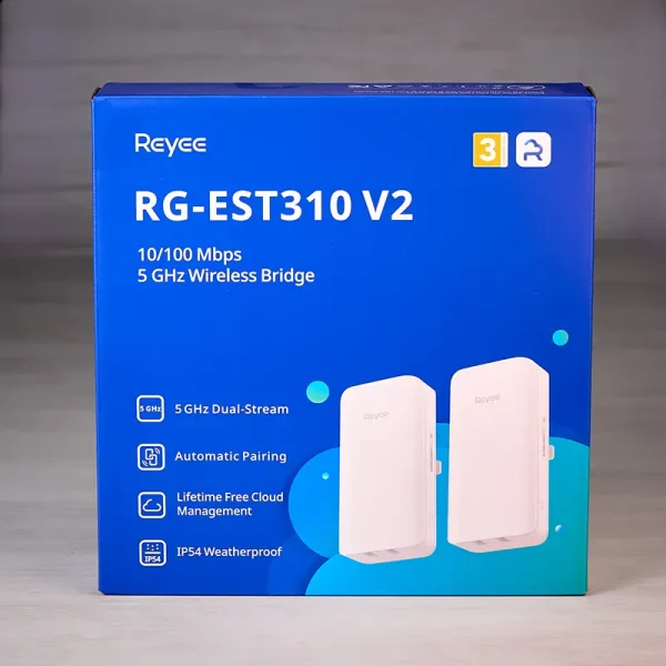 A box of Reyee wireless bridges with the text 10/100 Mbps and 5 GHz Wireless Bridge. There are four icons at the bottom right showing features of the device including automatic pairing and lifetime free cloud management