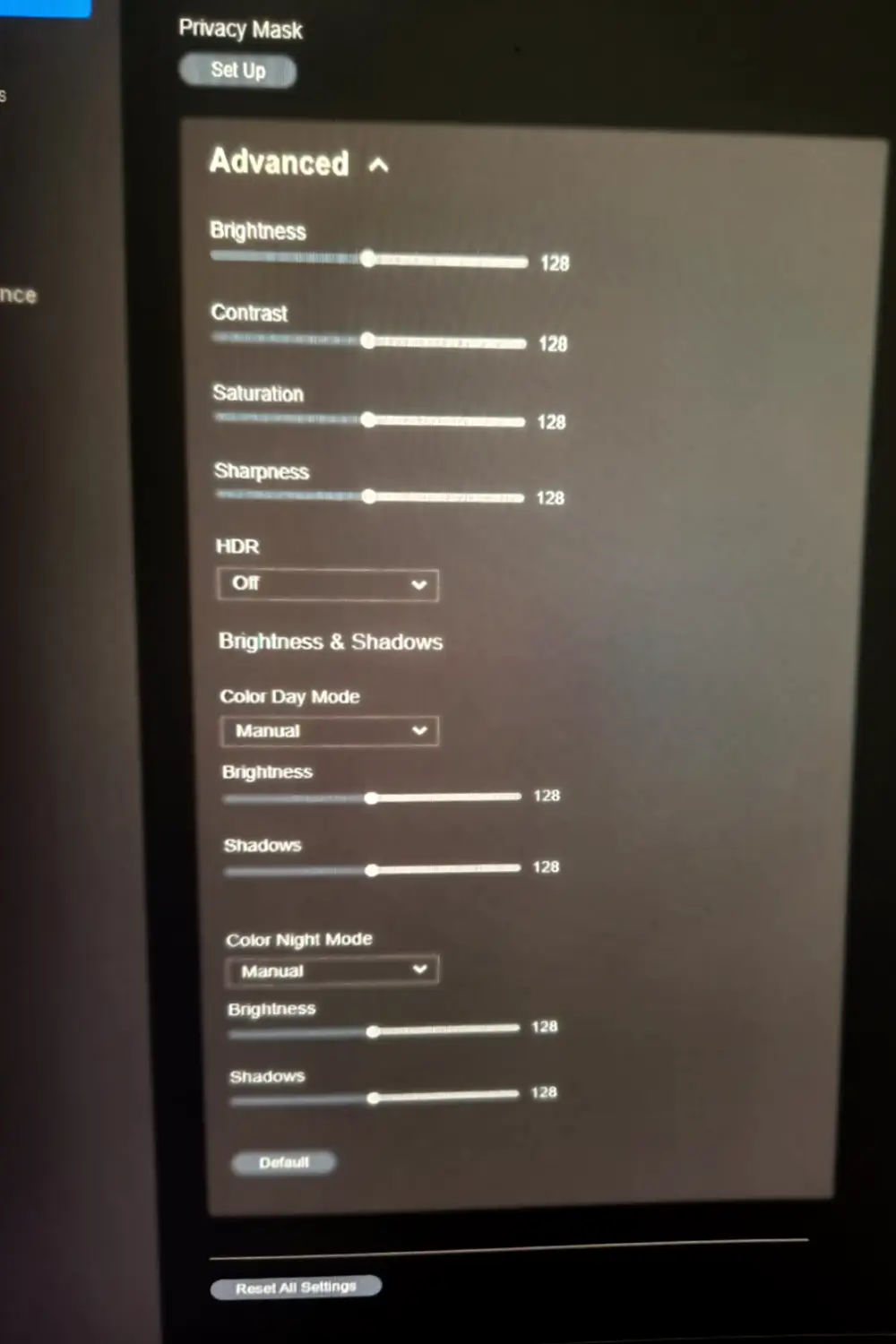 The settings page from the Reolink CX820 security camera showing brightness, contrast, saturation, and sharpness sliders.