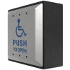 A side angle of a disability push to open metal button for wheelchair accessible doors.