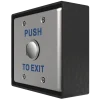 The side view of a metal push to exit switch, which is surrounded by a black junction box that's designed to be installed near an accessible door.