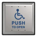 A square metal push to open button with a blue handicap wheelchair icon in the center