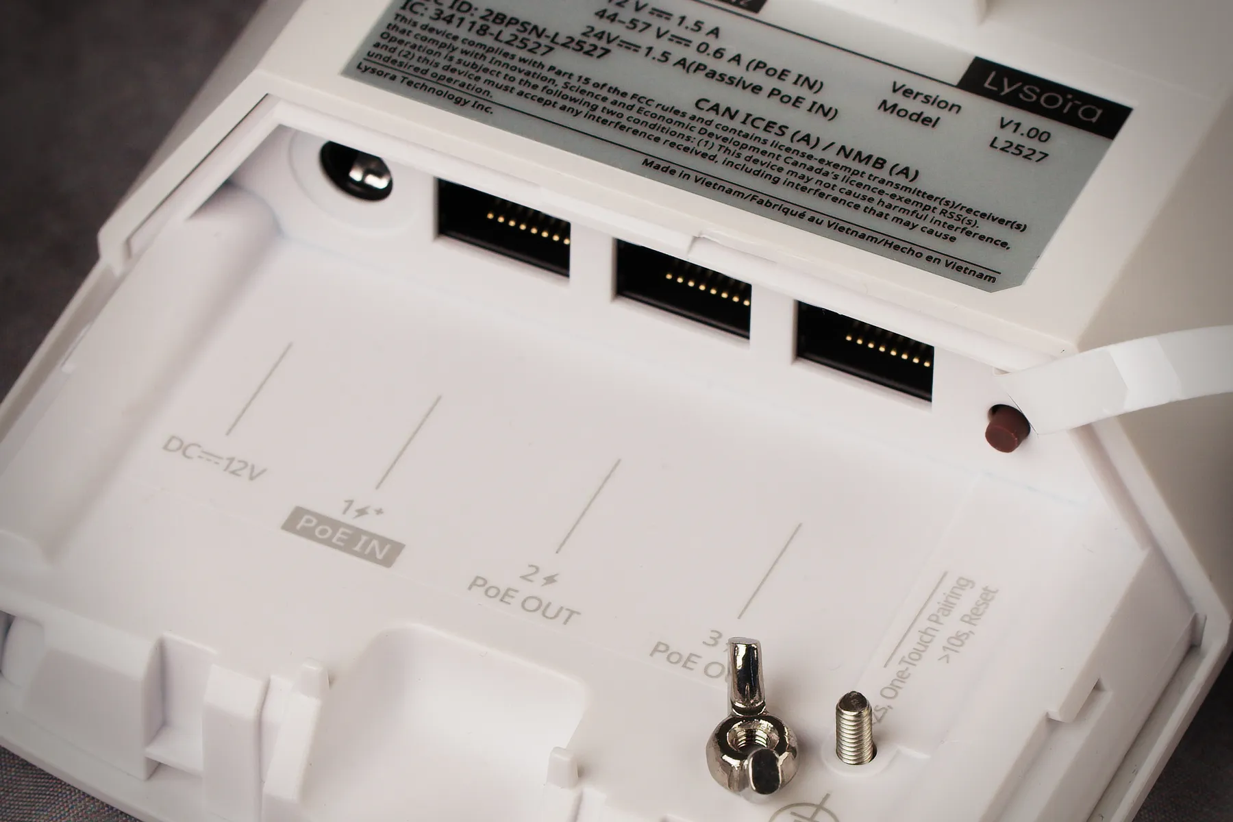 Lysora's CPE3-P wireless bridge with 3 LAN ports, of which the leftmost one is a PoE input and the two beside it are PoE outputs
